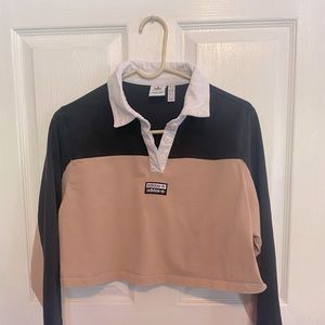 Adidas cropped rugby style shirt.
